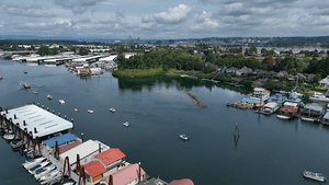 Drone shot of the tail end of the Smile Parade on the Columbia river