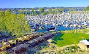 Ariel view of the uplands at Tomahawk Bay Marina on Hayden Island in Portland Oregon, seating, greenspace, medows, and marina docks.