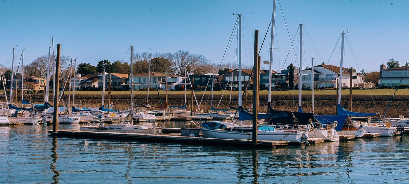 Sail boats moored at the docks of Hayden Bay in Portland, Oregon
