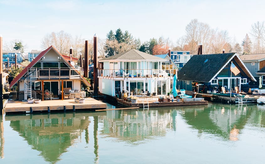 Three beautiful Floating homes each with back decks at island Cove Marina in Portland Oregon
