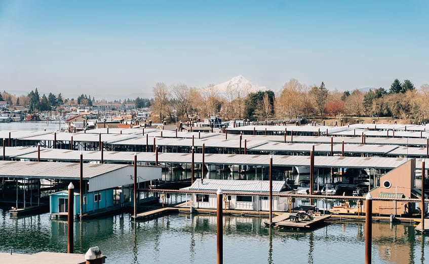 Covered Slips At Jantzen bay Marina in Portland Oregon with mount hood in the background